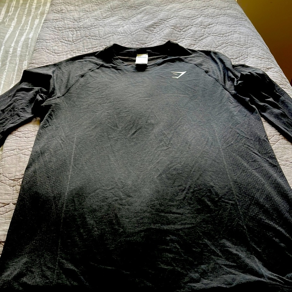 Black and grey long sleeve Gymshark tshirt $15.00 dollars each